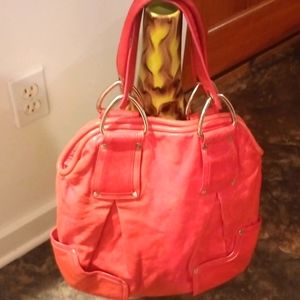 Woman's pink leather Kooba purse